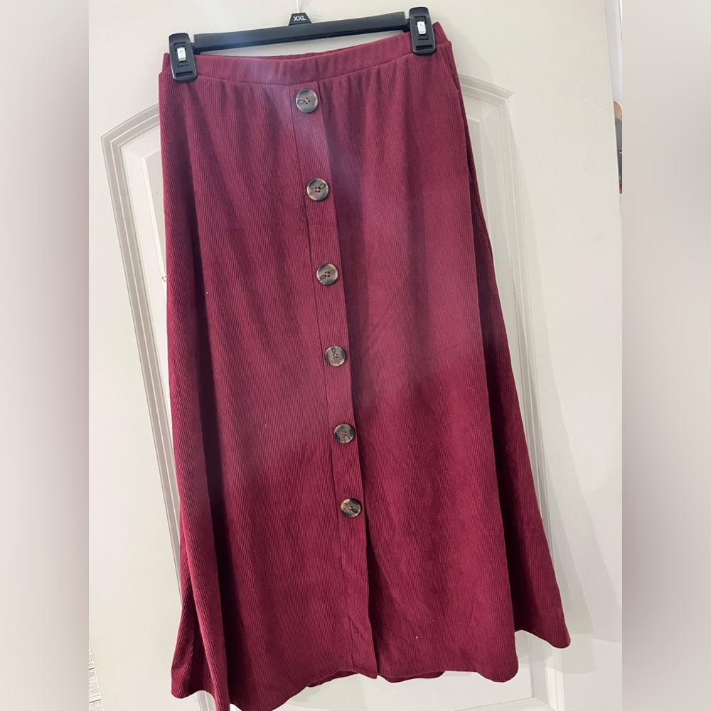 Les Amis boutique brand midi skirt.
